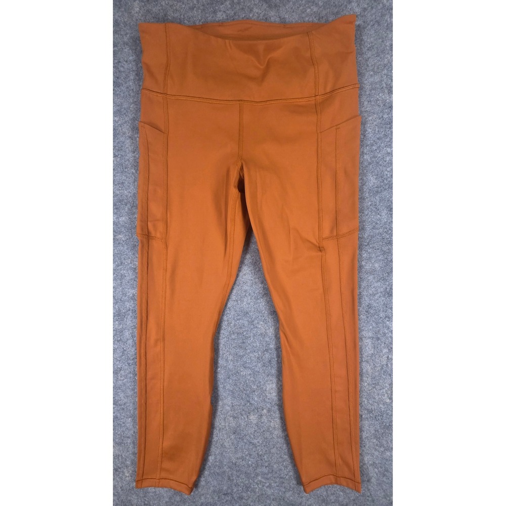 Athleta Ultimate Stash 7/8 Tight Leggings Burnt Orange Medium High Rise Pockets